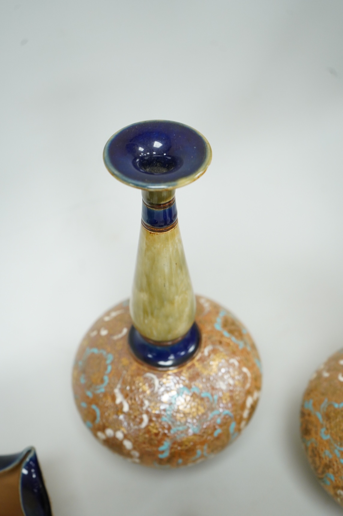 A pair of Royal Doulton Slater’s patent vases, 26cm high and pots and a jug together with a collection of miniature stoneware pots jugs and a pair of peppers